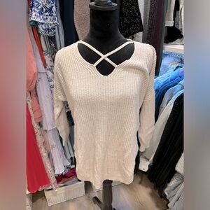 Express women’s light pink sweater with front cut out size extra small